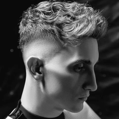 Young man with a burst fade haircut